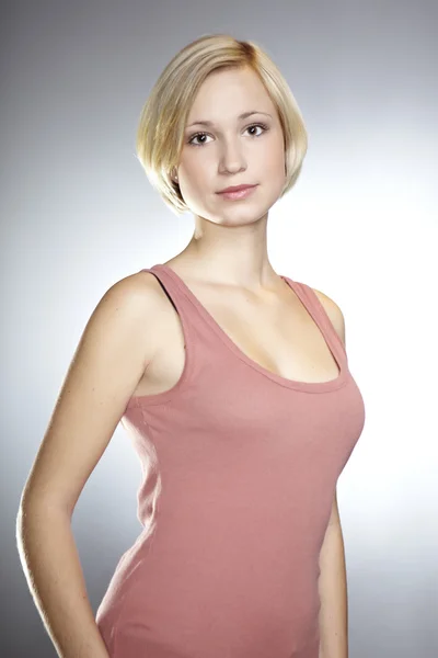 Girl posing in studio for portrait photos — Stock Photo, Image