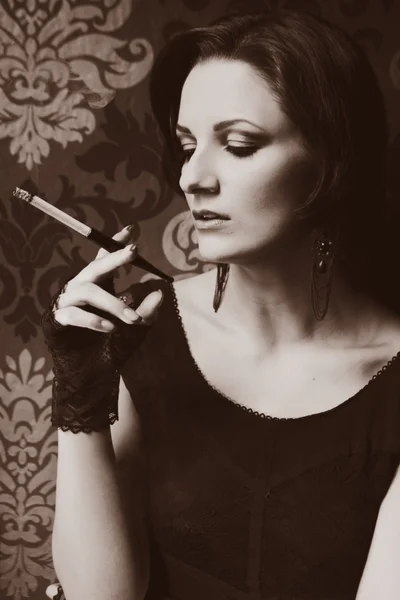 Nice lady model posing as a cigarette smoker — Stock Photo, Image