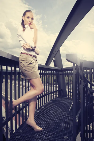 Pretty girl on bridge — Stock Photo, Image