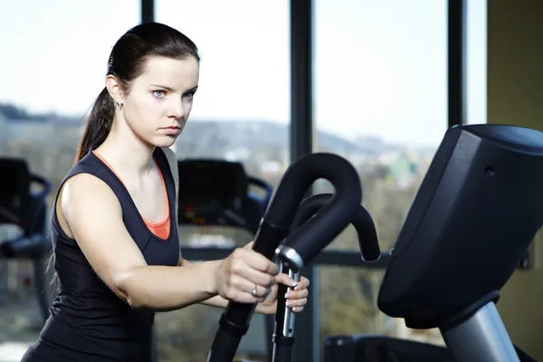Young female model in modern fitness center — Stock Photo, Image