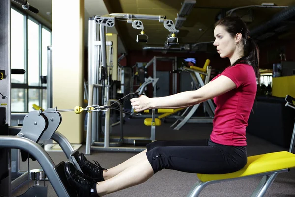 Young female model in modern fitness center — Stock Photo, Image