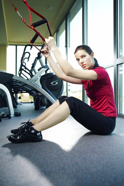 Young female model in modern fitness center — Stock Photo, Image
