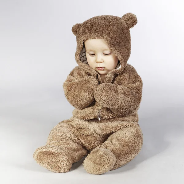 Kid in a bear suit — Stock Photo, Image