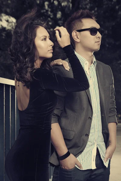 Couple posing on the bridge — Stock Photo, Image