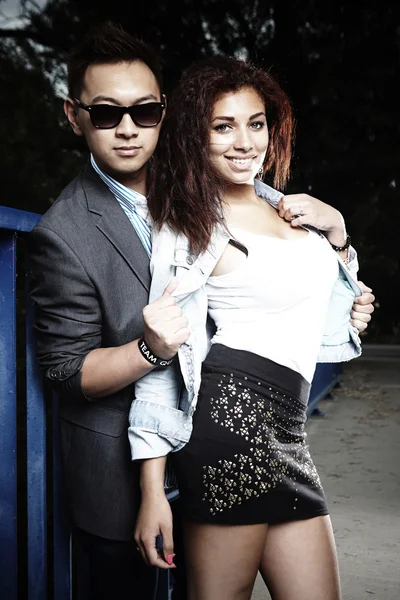 Couple posing on the bridge — Stock Photo, Image