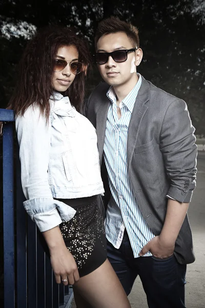 Couple posing on the bridge — Stock Photo, Image