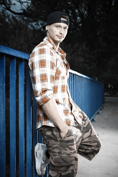 Man posing on the bridge — Stock Photo, Image