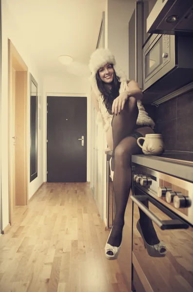 Young female model on kitchen — Stock Photo, Image