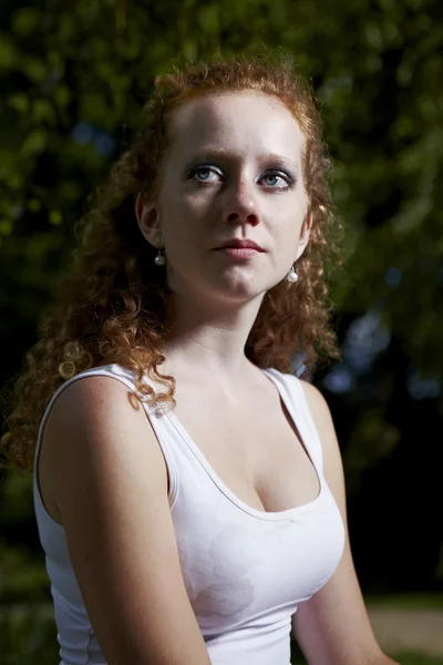 Redhead lady in summer park — Stock Photo, Image