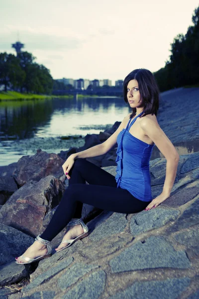 Slim lady by the river — Stock Photo, Image