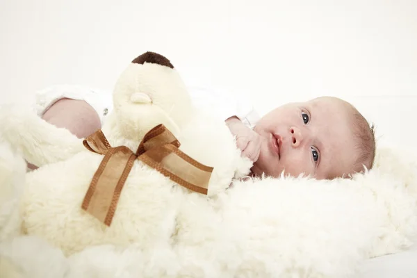 Baby with toy bear — Stock Photo, Image