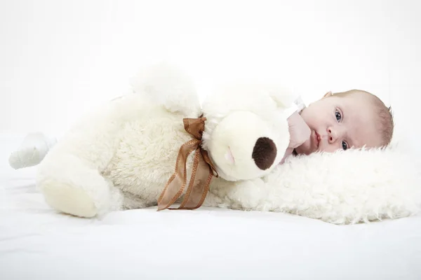 Baby with toy bear — Stock Photo, Image