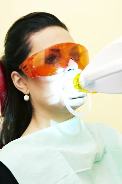 Woman taking teeth whitening procedure — Stock Photo, Image