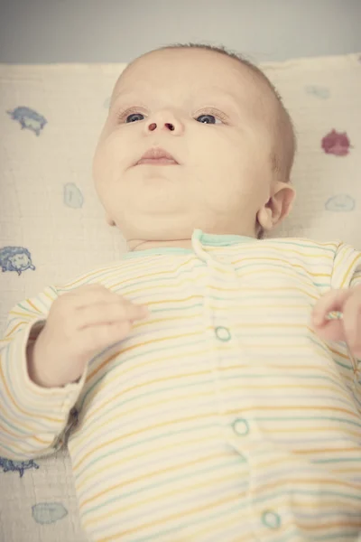 Little baby boy laying on bed — Stock Photo, Image