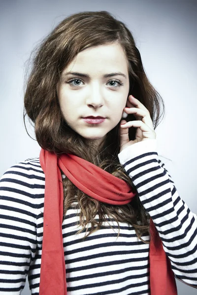 Girl in striped shirt with red scarf — Stock Photo, Image