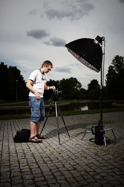 Photographer working on location — Stock Photo, Image