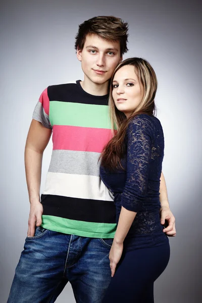 Loving couple in studio — Stock Photo, Image