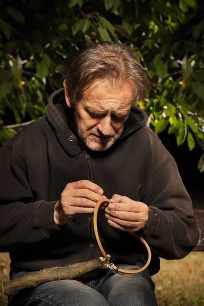 Older Man Finishing Traditional Slingshot Wooden Fork — Stock Photo, Image