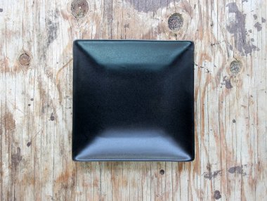 Empty plate in the wood