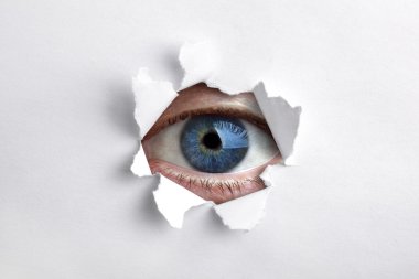 Looking through a hole in white paper clipart