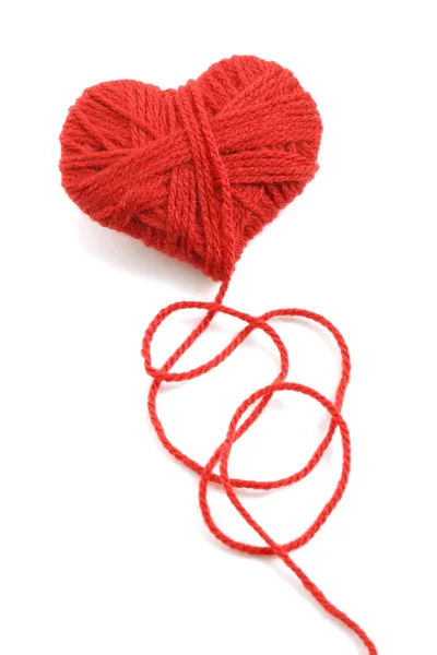 Yarn of wool in heart shape symbol — Stock Photo, Image