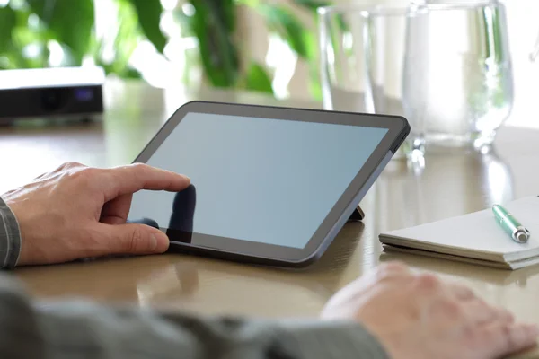 Touching screen of a digital tablet — Stock Photo, Image