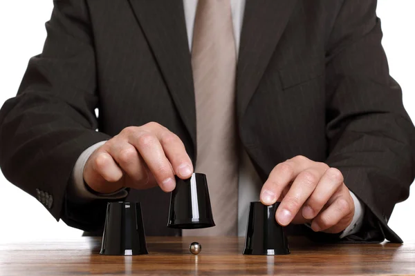 Cup and ball guessing game — Stock Photo, Image