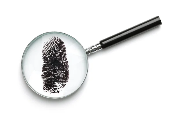 Magnifying glass examining fingerprint — Stock Photo, Image