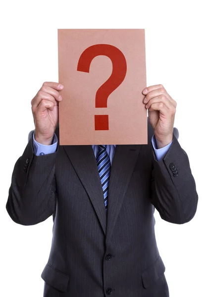 Man covering his face with a question mark sign — Stock Photo, Image