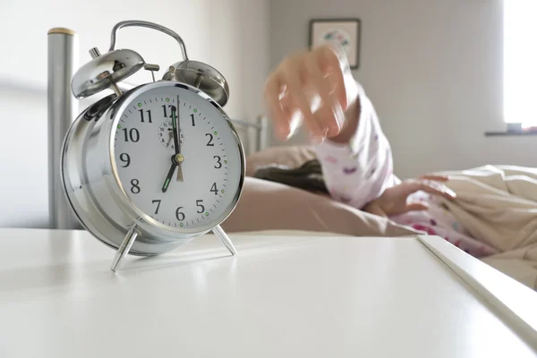 Turning off alarm clock — Stock Photo, Image