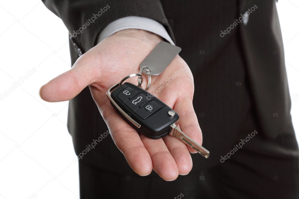 Handing over the car key Stock Photo by ©BrianAJackson 24532899