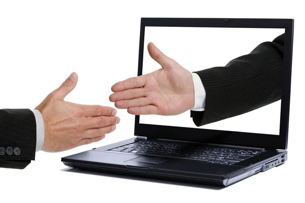 Handshake prostřednictvím monitoru — Stock fotografie