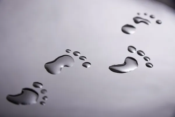 Footprints made from water — Stock Photo, Image