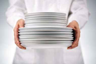 Holding plates clipart