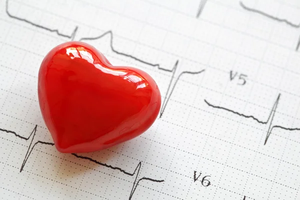 Cardiogram and heart — Stock Photo, Image