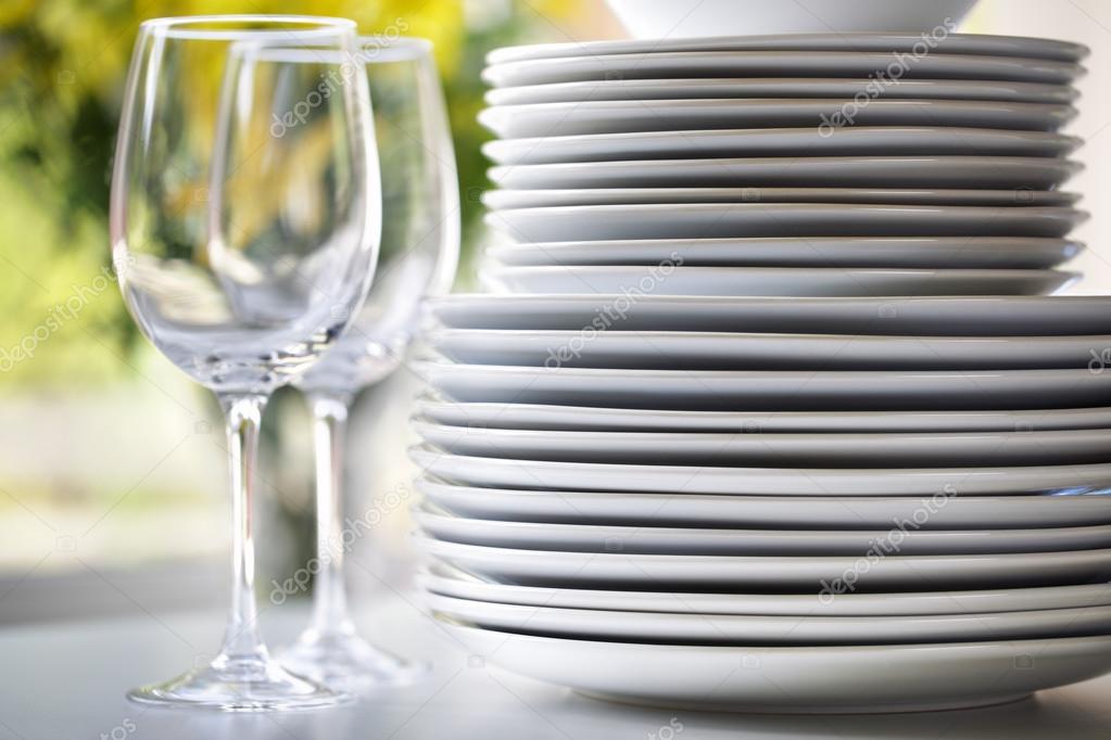 White plates and wine glasses Stock Photo by ©BrianAJackson 31685027