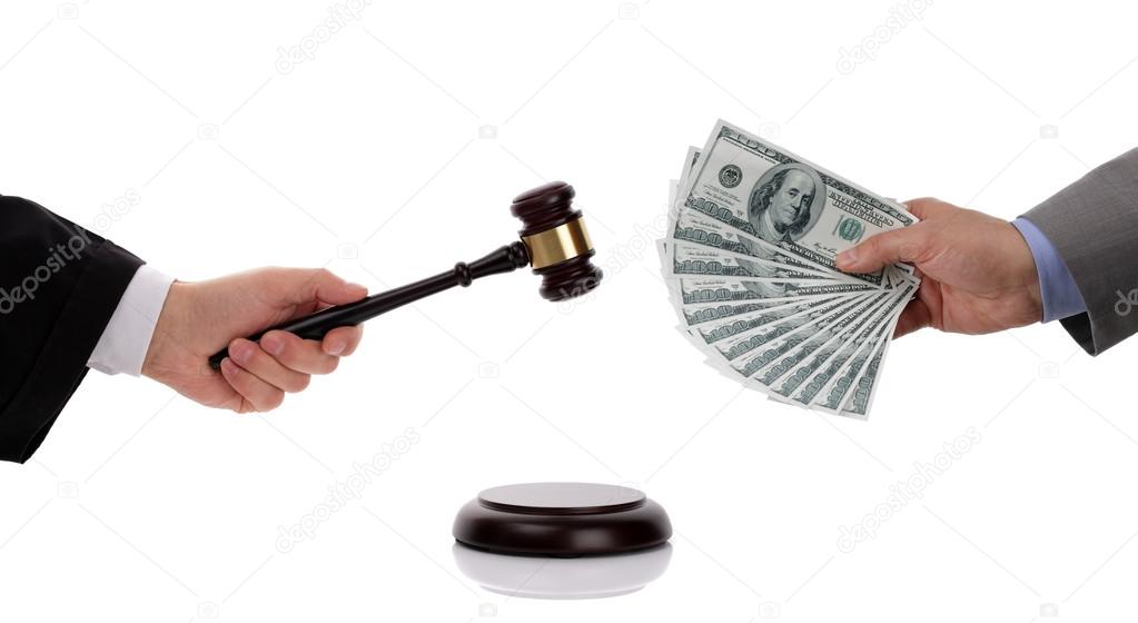 Judge with gavel and businessman with money