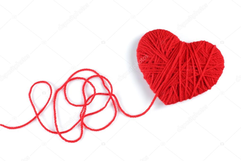 Yarn of wool in heart shape symbol