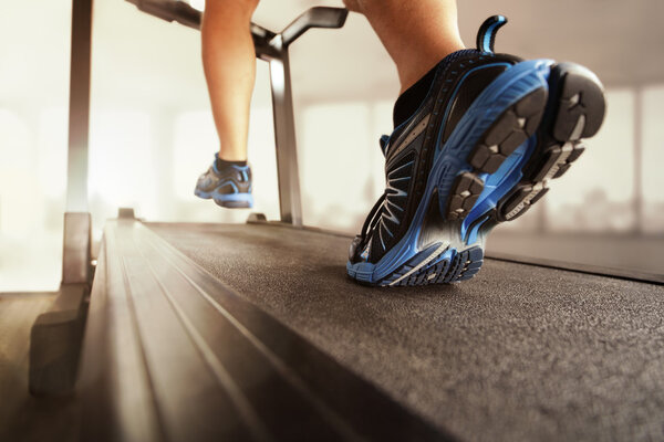 Man running on treadmill