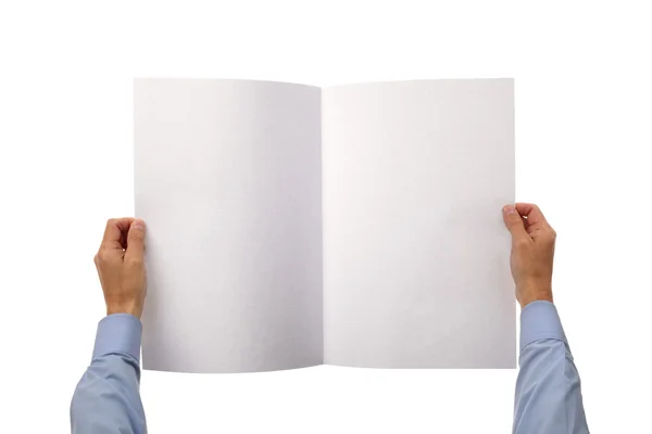 Mãos segurando jornal em branco — Fotografia de Stock