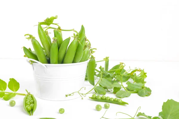Fresh Organic Raw Green Peas Pods Bowl Plants Leaves White — Zdjęcie stockowe
