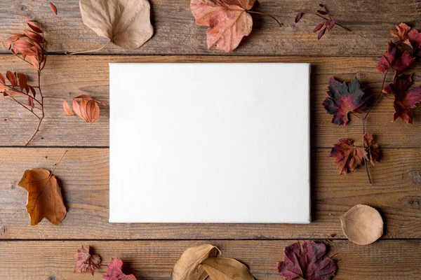 Autumn blank canvas mockup for artwork, poster frame. Thanksgiving day card mockup, DIY invitation, holidays preparation and creativity layout, canvas template, top view, flat lay