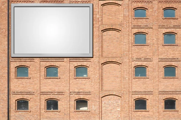 Panneau d'affichage sur un bâtiment — Photo