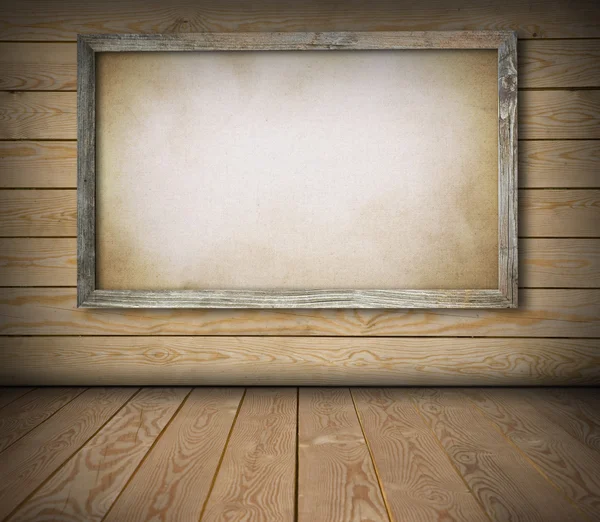 Old board on wooden wall — Stock Photo, Image