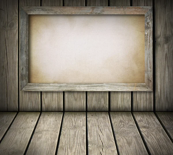 Old board on wooden wall — Stock Photo, Image