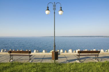 Benches on the lakeshore clipart