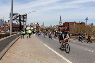 Bikers participating in the Five Boro Bike tour on the BQE