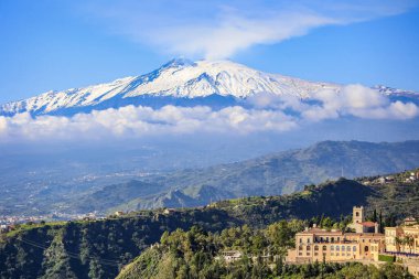 TAORMINA, ITALY - November 2021: View of Etna Mount from Taormina teatro greco on sunny day, Sicily, Italy clipart