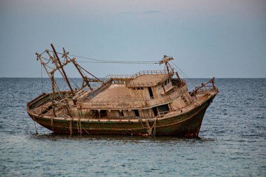 MARSA ALAM, EGYPT - December 2021: Fishing wooden ship wreckin Marsa Alam, Egypt