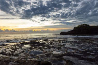 Breathtaking sunset in Bali near Tanah Lot temple, Indonesia
